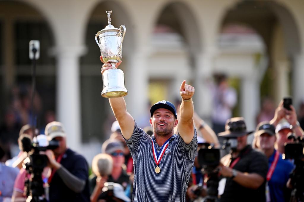 Bryson DeChambeau celebrates winning the U.S. Open.