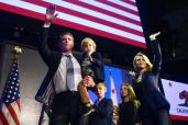 California's Democratic gubernatorial candidate Gavin Newsom and his family waves to supporters from stage at his election night watch party in Los Angeles, California on November 6, 2018.