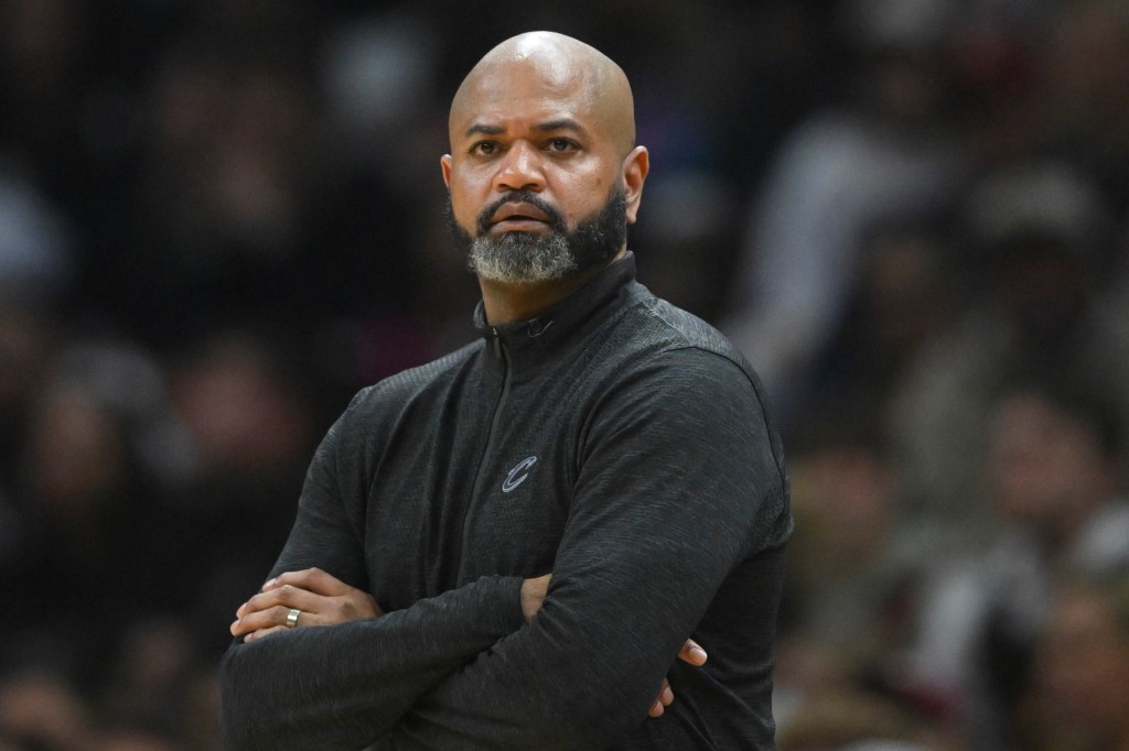 Cleveland Cavaliers head coach J. B. Bickerstaff, with his arms crossed, reacting during the second quarter of game three of the 2024 NBA playoffs against the Boston Celtics