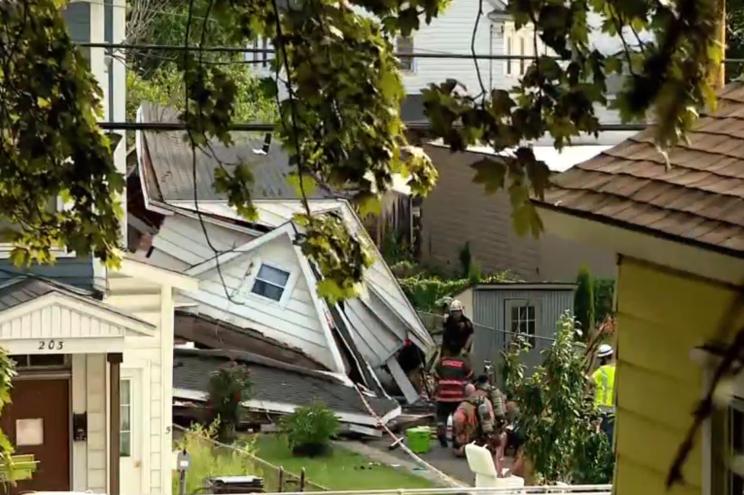 At least ten people were injured when a house went down in Syracuse.