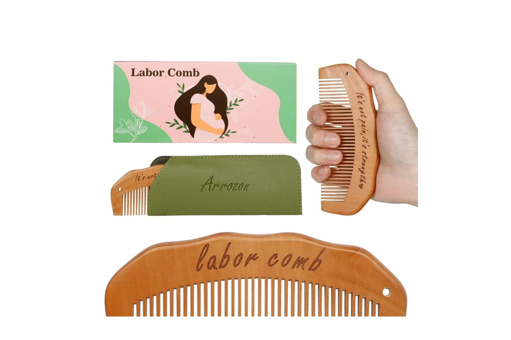 A hand holding a comb