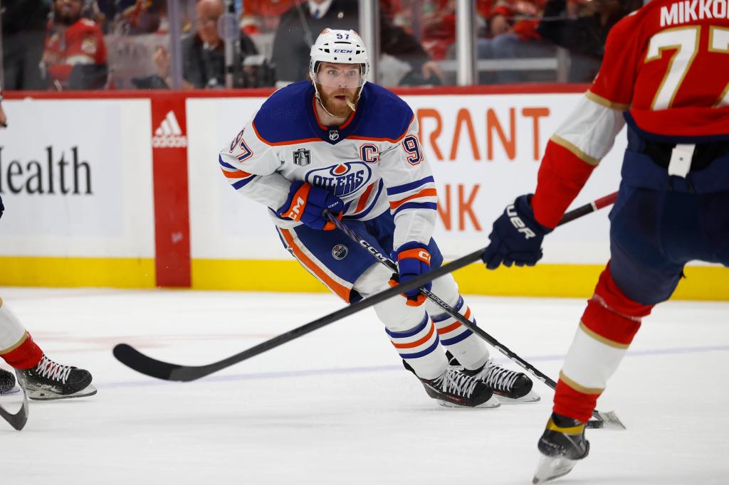 Connor McDavid, #97 of the Edmonton Oilers, skating with the puck against the Florida Panthers during Game Five of the Stanley Cup Final