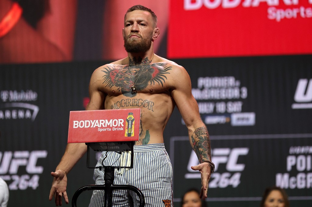 Conor McGregor posing during a ceremonial weigh-in for UFC 264 in Las Vegas, Nevada.