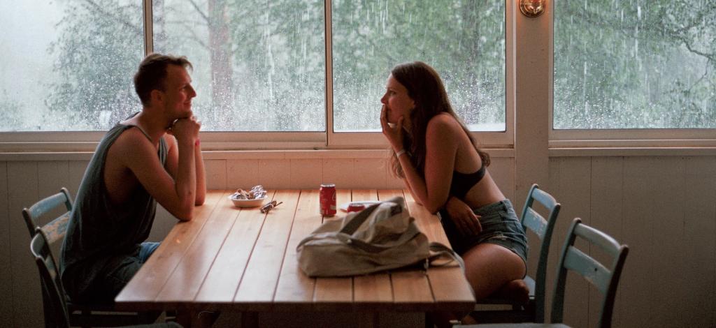 A group of women engaged in an in-depth conversation at a table during a date