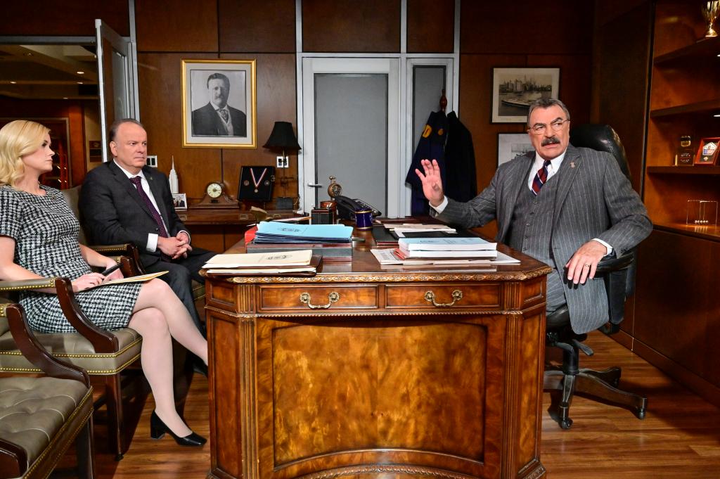 Abigail Hawk as Abigail Baker, Robert Clohessy as Lt. Gormley, and Tom Selleck as Frank Reagan. 