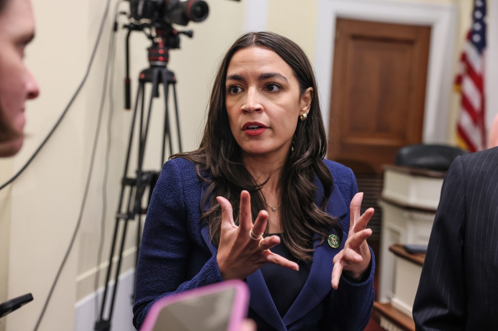 Rep. Alexandria Ocasio-Cortez (D-NY) speaks to journalists following a roundtable discussion on Supreme Court Ethics conducted by Democrats of the House Oversight and Accountability Committee at the Rayburn House Office Building on June 11, 2024 in Washington, DC. 