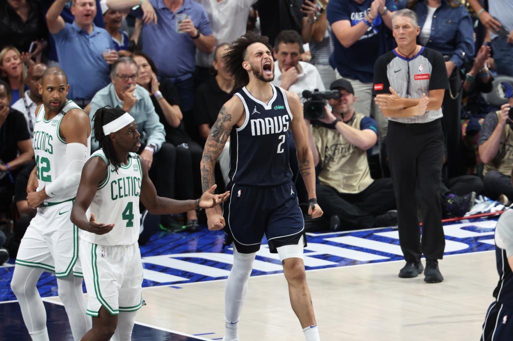 Dallas Mavericks center Dereck Lively II (2) reacts during the second half against the Boston Celtics in game four of the 2024 NBA Finals at American Airlines Center. 