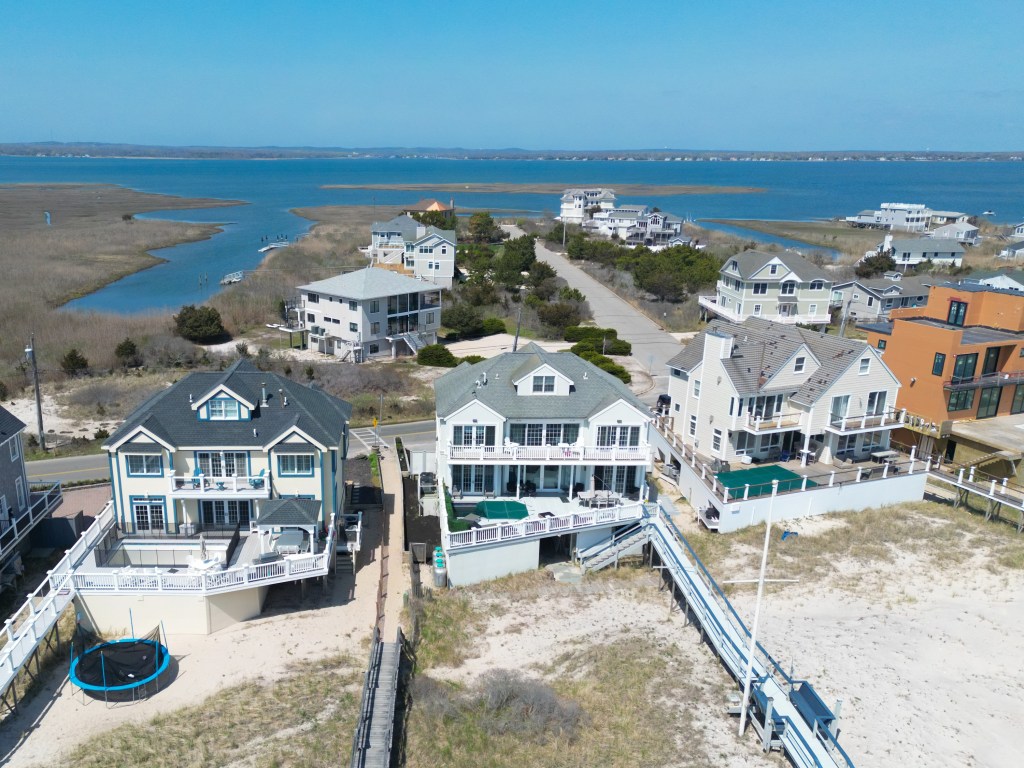 Aerial view of luxury homes along the beach in the Hamptons Long Island New York