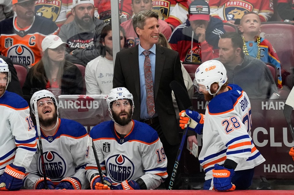 Edmonton Oilers head coach Kris Knoblauch, center, reacts during the first period of Game 7 of the NHL hockey Stanley Cup Final.