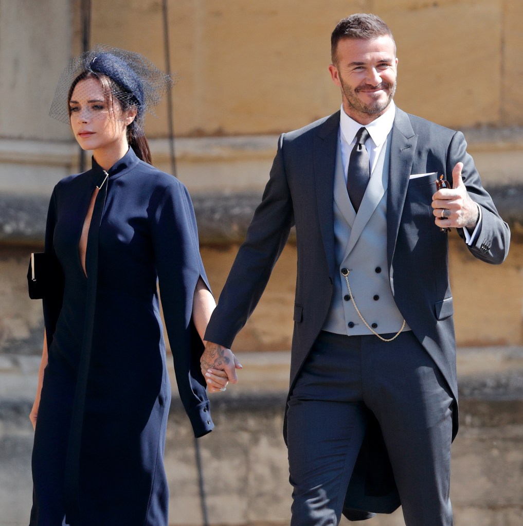 Victoria Beckham and David Beckham attending the wedding of Prince Harry and Meghan Markle at Windsor Castle