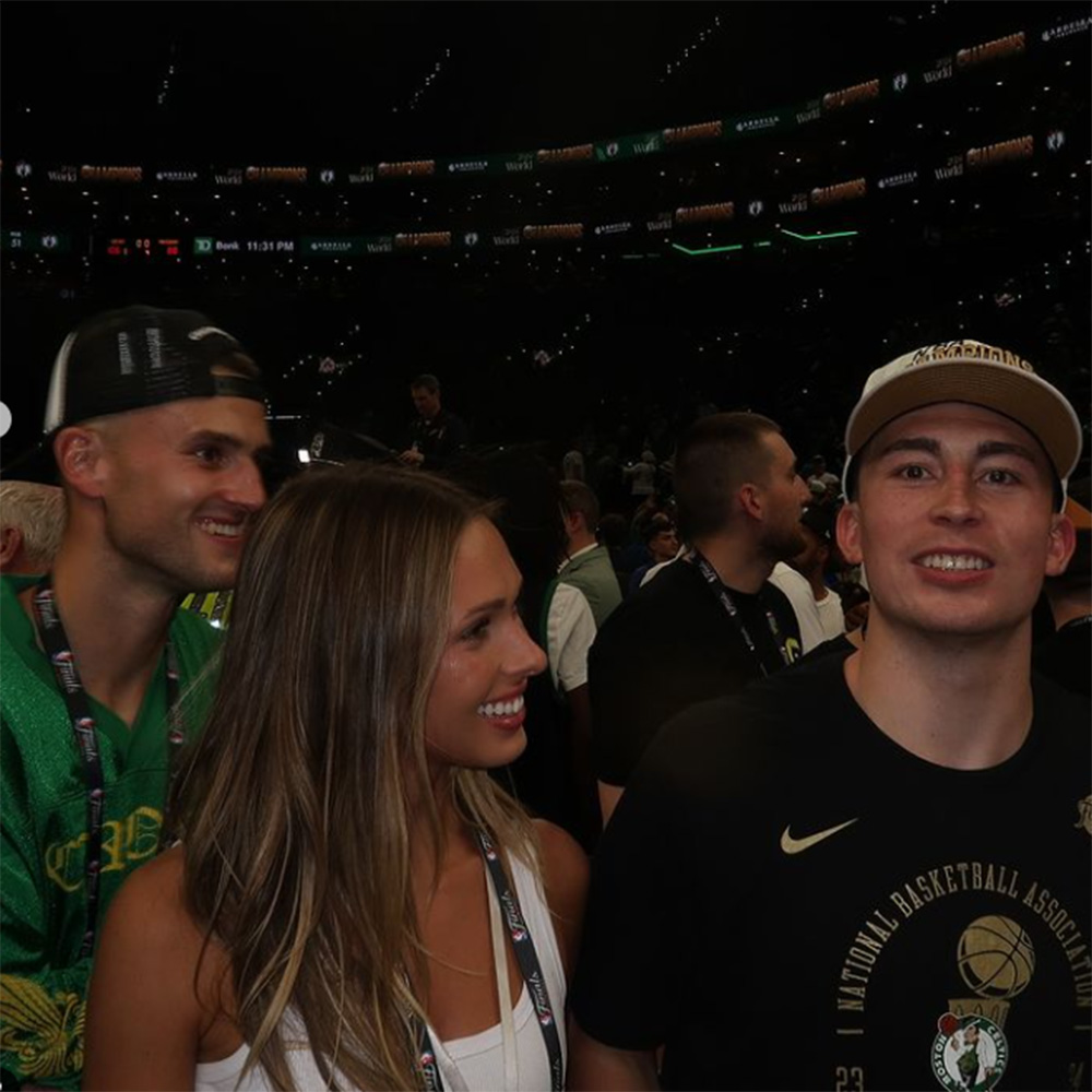 Celtics point guard Payton Pritchard and his fiancée Emma Macdonald on the court at TD Garden after the Celtics' win over the Mavericks in Game 5 of the NBA Finals at TD Garden on June 17, 2024.  