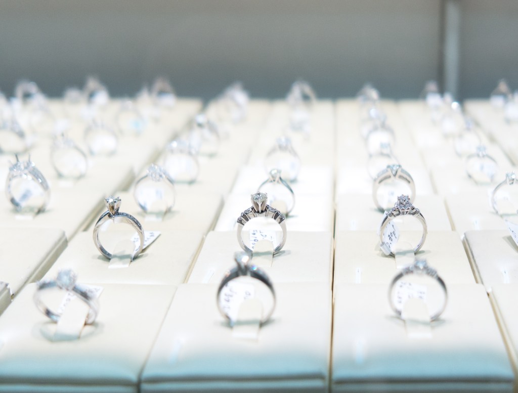 Engagement rings on display in a jewelry store
