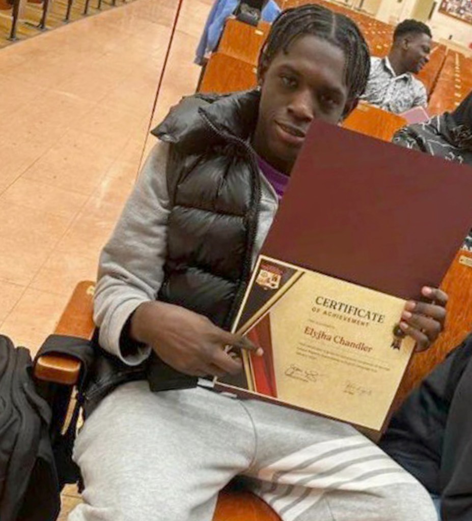 The teen who went missing in the water is seen with an academic certificate.