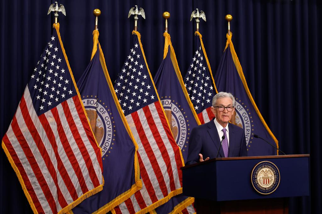 Federal Reserve Bank Chair Jerome Powell announcing unchanged interest rates at a news conference in Washington, DC