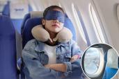 Female passenger sleep on plane flight