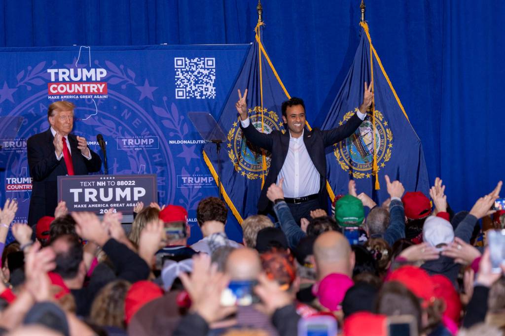 Former president Donald J. Trump and Vivek Ramaswamy address the crowd at a Trump campaign rally at Atkinson Country Club and Resort in Atkinson, N.H., on Jan. 16, 2024.