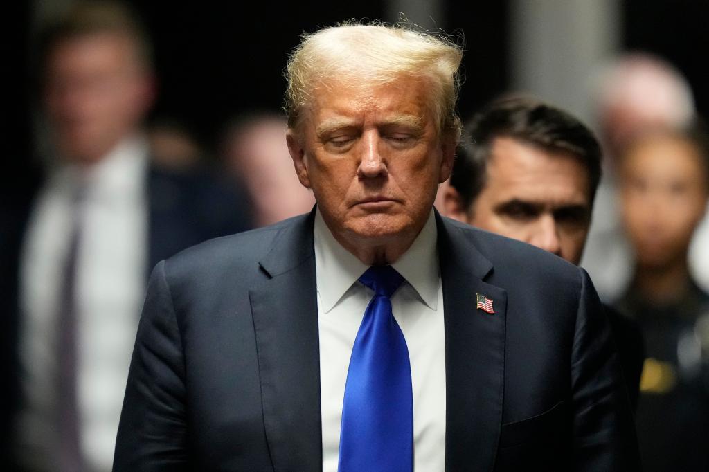 Former President Donald Trump walking towards the media to comment after his felony conviction at Manhattan Criminal Court