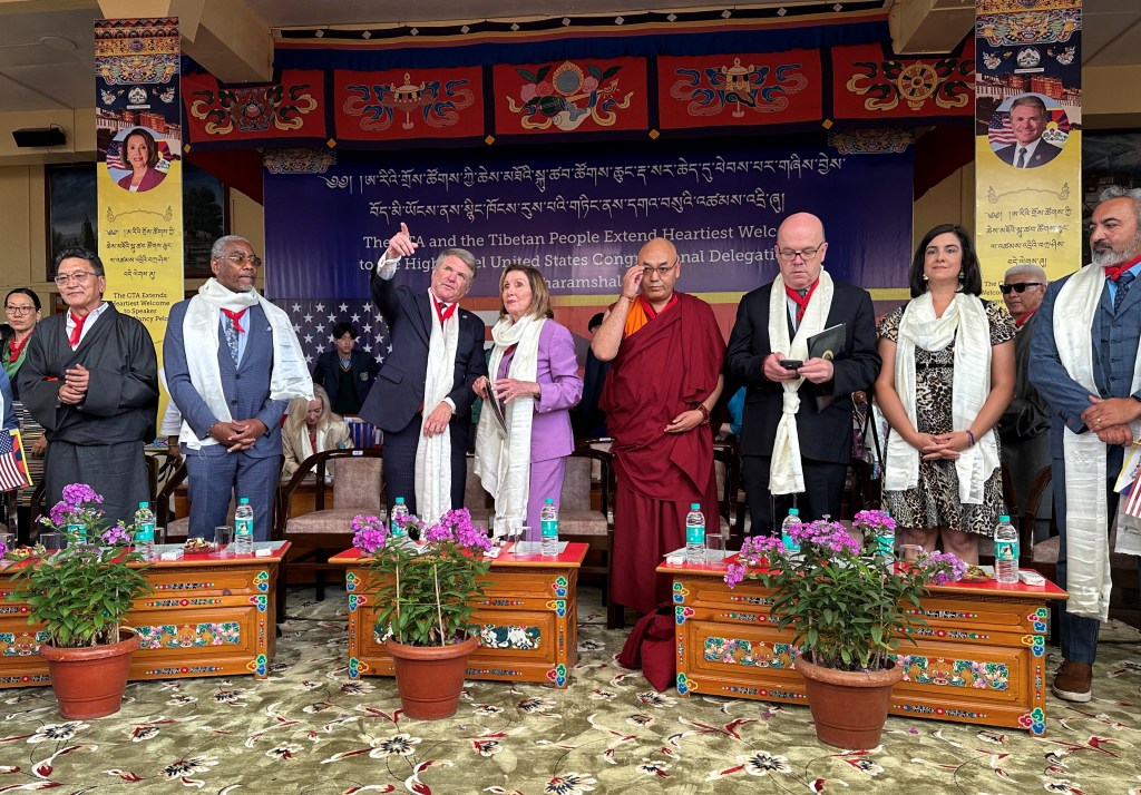 Former U.S. House speaker Nancy Pelosi along with Michael McCaul, the U.S. Republican chair of the House Foreign Affairs Committee, takes part during a function at the Dalai LamaÃs temple after meeting with him in Dharamshala, Himachal Pradesh, India, June 19, 2024. 