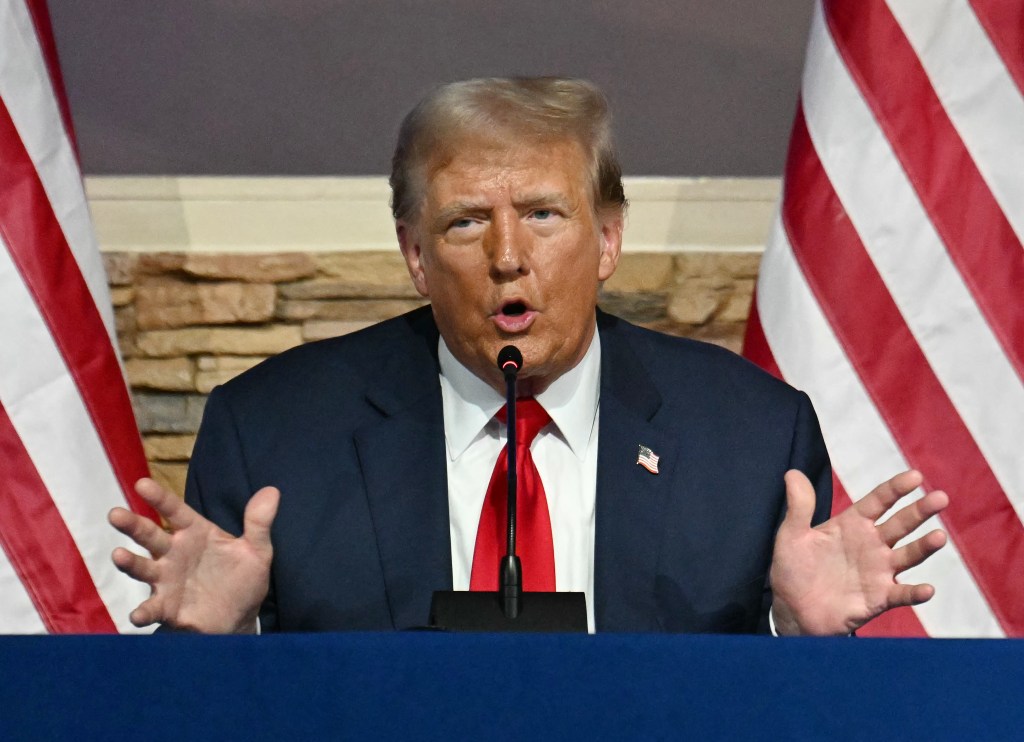 Former US President and Republican presidential candidate Donald Trump participates in a community roundtable at the 180 Church in Detroit, Michigan, on June 15, 2024.