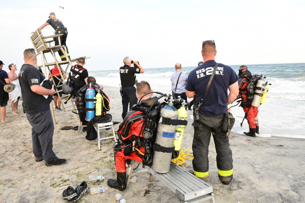 Divers seen on the beach where the teen went missing.