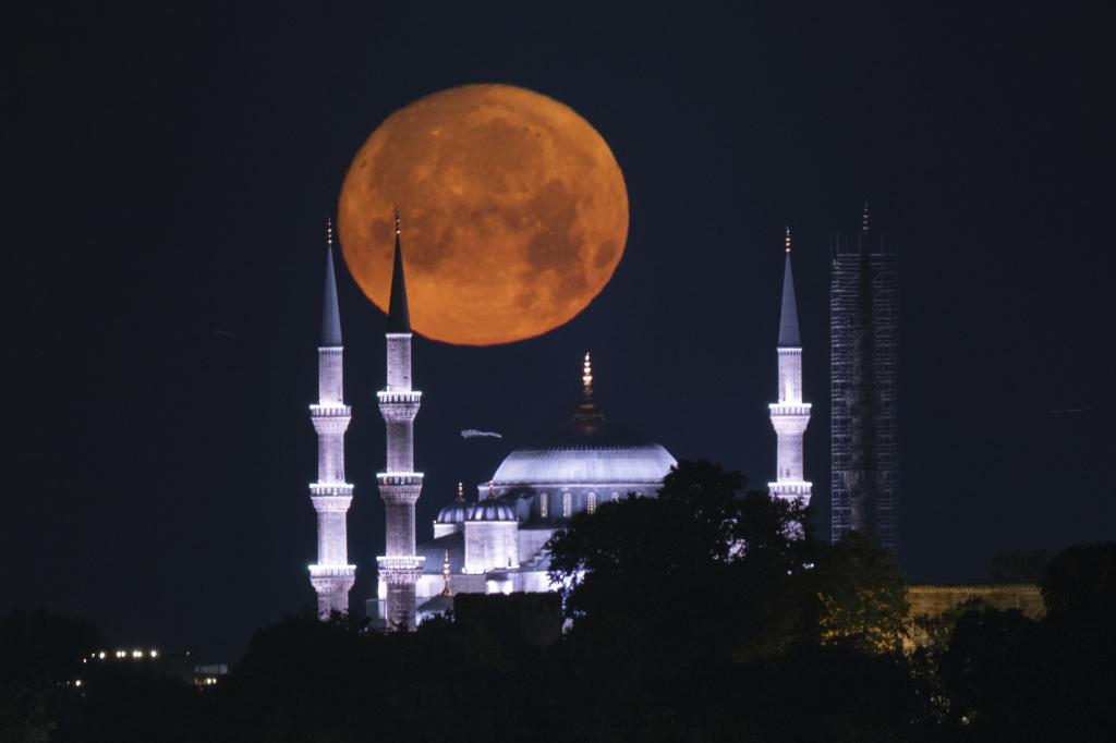ISTANBUL, TURKIYE - JUNE 21: Full Moon rises over Blue Mosque in Istanbul, Turkiye on June 20, 2024. (Photo by Isa Terli/Anadolu via Getty Images)