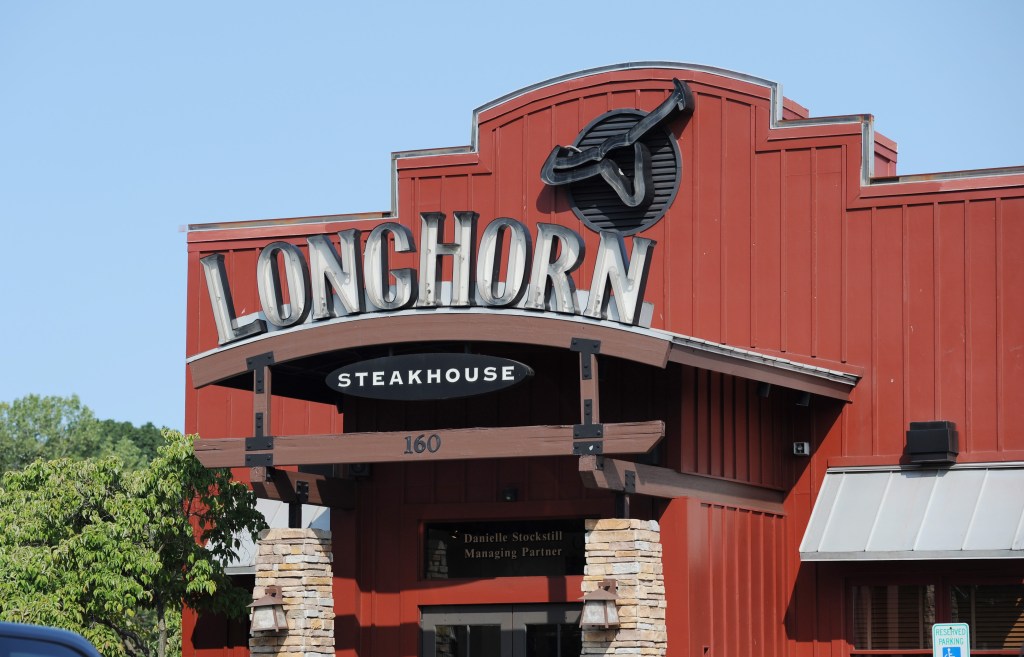 LongHorn Steakhouse sign on a red building in Rochelle Park, NJ.