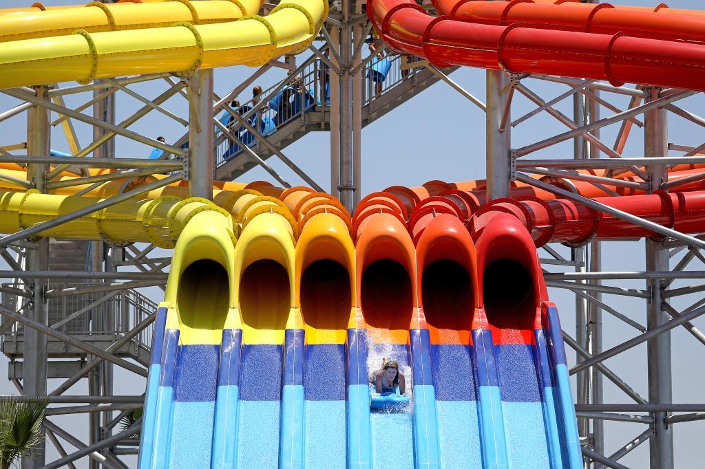 Guests enjoying a ride on the Tomcat Racers at the newly reopened Wild Rivers water park in Irvine, CA.