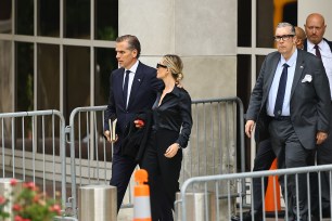 Hunter Biden and his wife, Melissa Cohen Biden, depart the J. Caleb Boggs Federal Building in Wilmington, Delaware.
