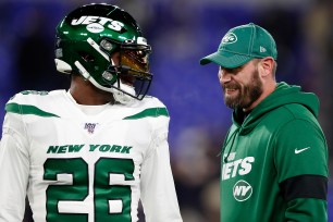 Le'Veon Bell and Adam Gase during Jets-Ravens in 2019.