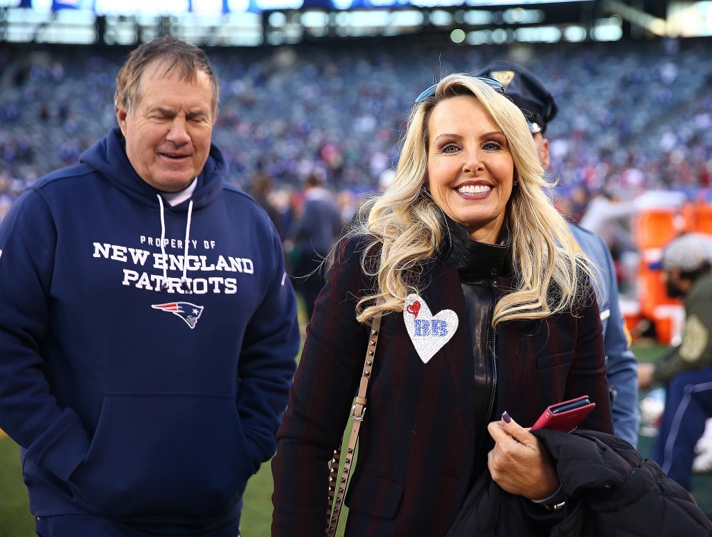 Head coach Bill Belichick of the New England Patriots and his girlfriend Linda Holliday are seen prior to the game against the New York Giants at MetLife Stadium on November 15, 2015 in East Rutherford, New Jersey.  