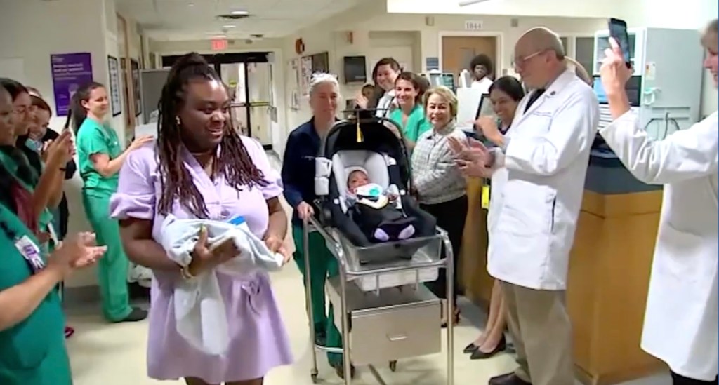 The hospital staff played graduation favorite "Pomp and Circumstance" in a hospital as Shyne was pushed out the front doors in her stroller surrounded by doctors and nurses.