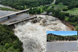 Several buildings and roads along Minnesota's Blue Earth River have been destroyed by flood waters following a breach at the Rapidan Dam on Monday, with residents in low-lying areas warned to evacuate the shores.