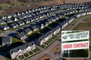 Housing development and under contract sign