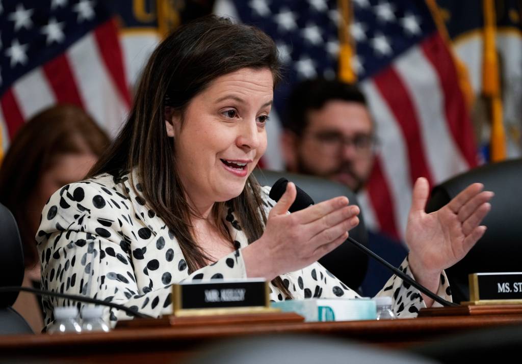Rep. Elise Stefanik speaking into a microphone at the 2024 Annual Threat Assessment held by the House Select Committee on Intelligence in Washington.