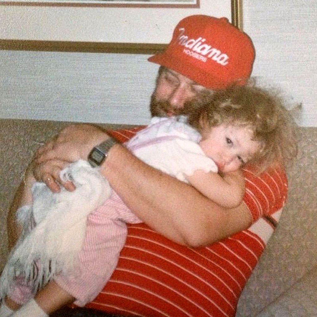 A childhood photo of Samantha McAfee with her dad.