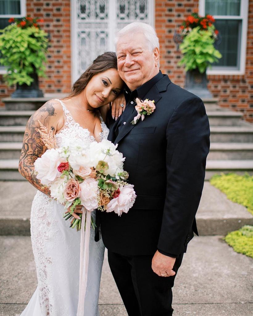 Samantha McAfee with her dad on her wedding day.