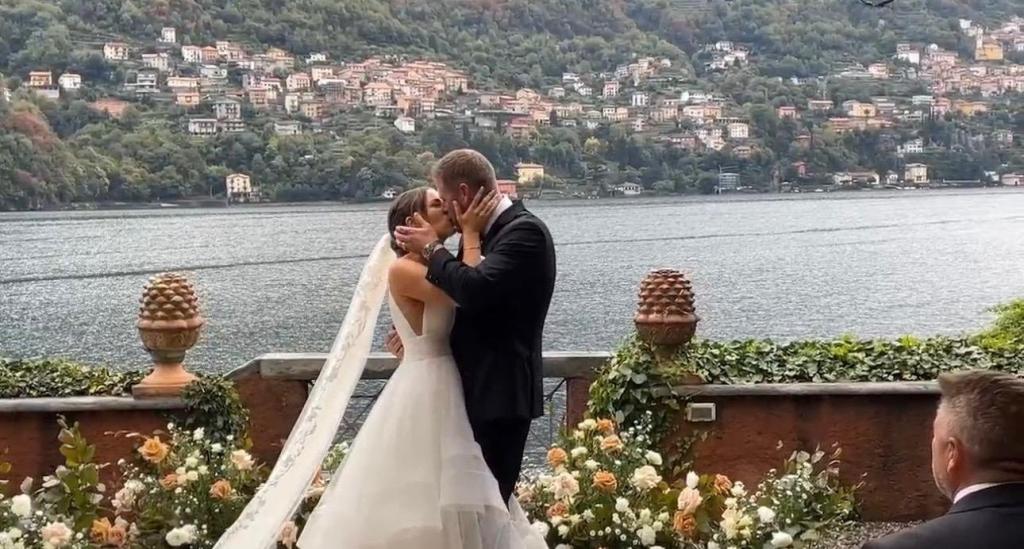 bride and groom kiss