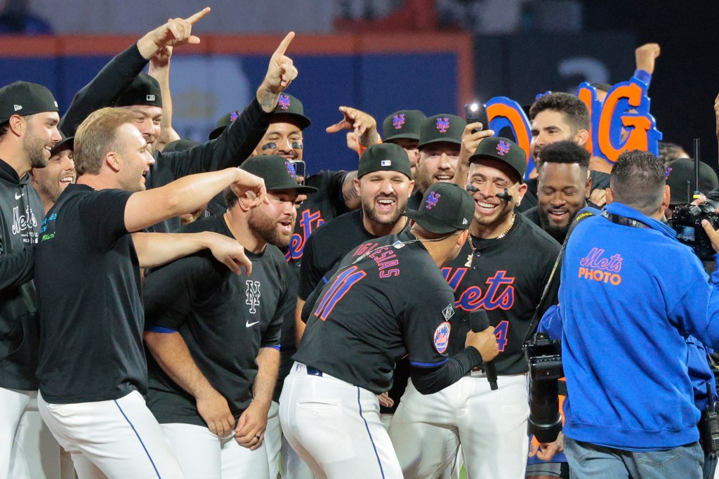 Mets players joined Jose Iglesias in performing the song.