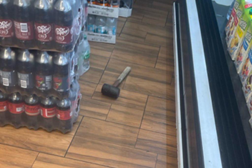 The sledgehammer was left behind on the floor of the bodega on East 188th Street.