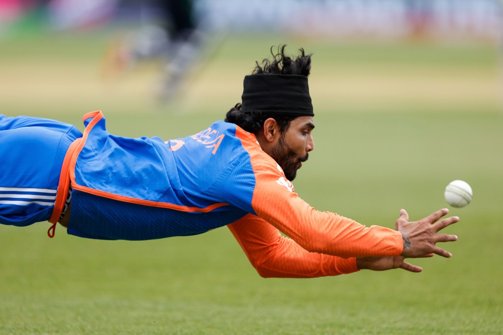 Ravindra Jadeja attempting a diving catch to out Ireland's Gareth Delany in a T20 World Cup Cricket match