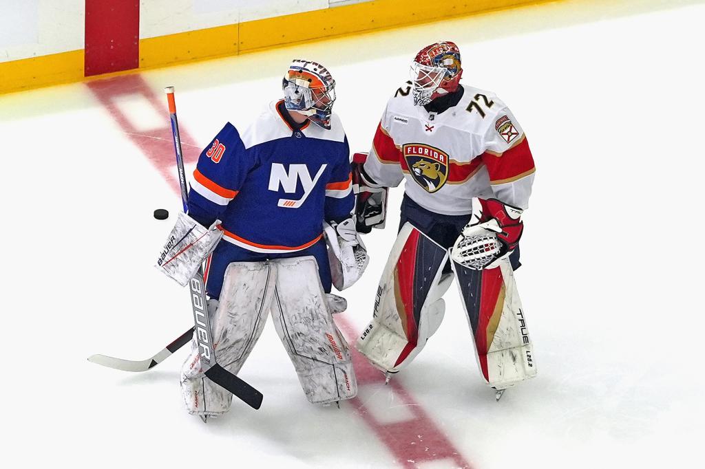 Ilya Sorokin of the New York Islanders and Sergei Bobrovsky of the Florida Panthers chatting during warm ups on ice before the game.