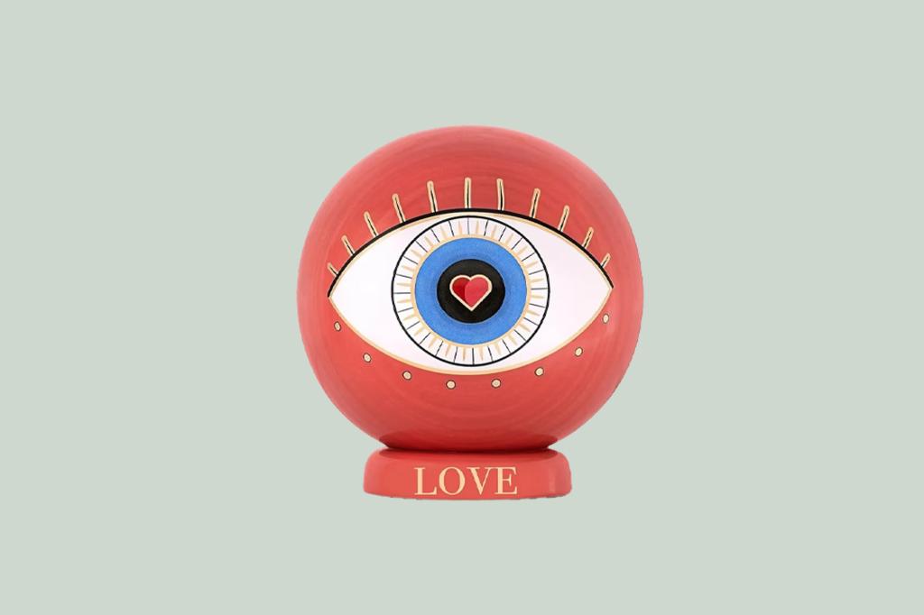 Red ball with a blue eye and a heart on it
