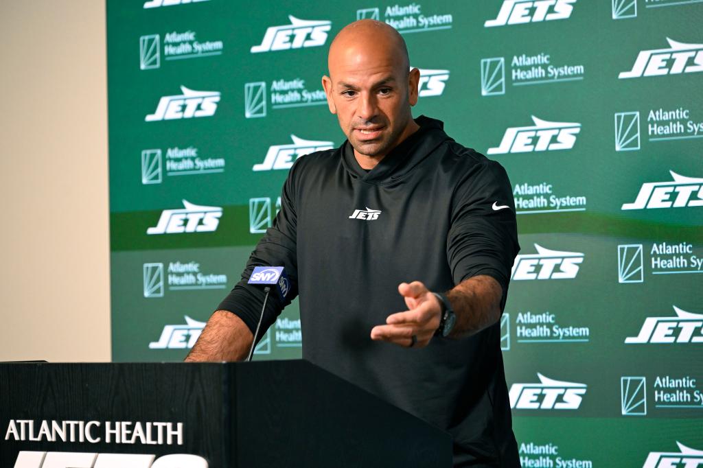 Jets head coach Robert Saleh speaking at a podium to the media before practice at minicamp in Florham Park, NJ.