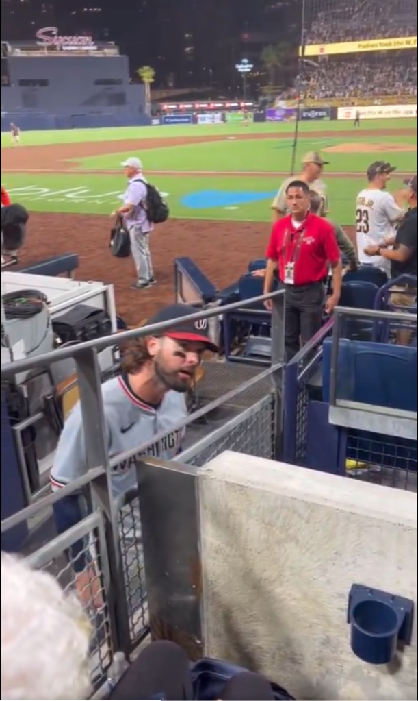 Jesse Winker argues with a fan about whether Jurickson Profar was thrown at. 