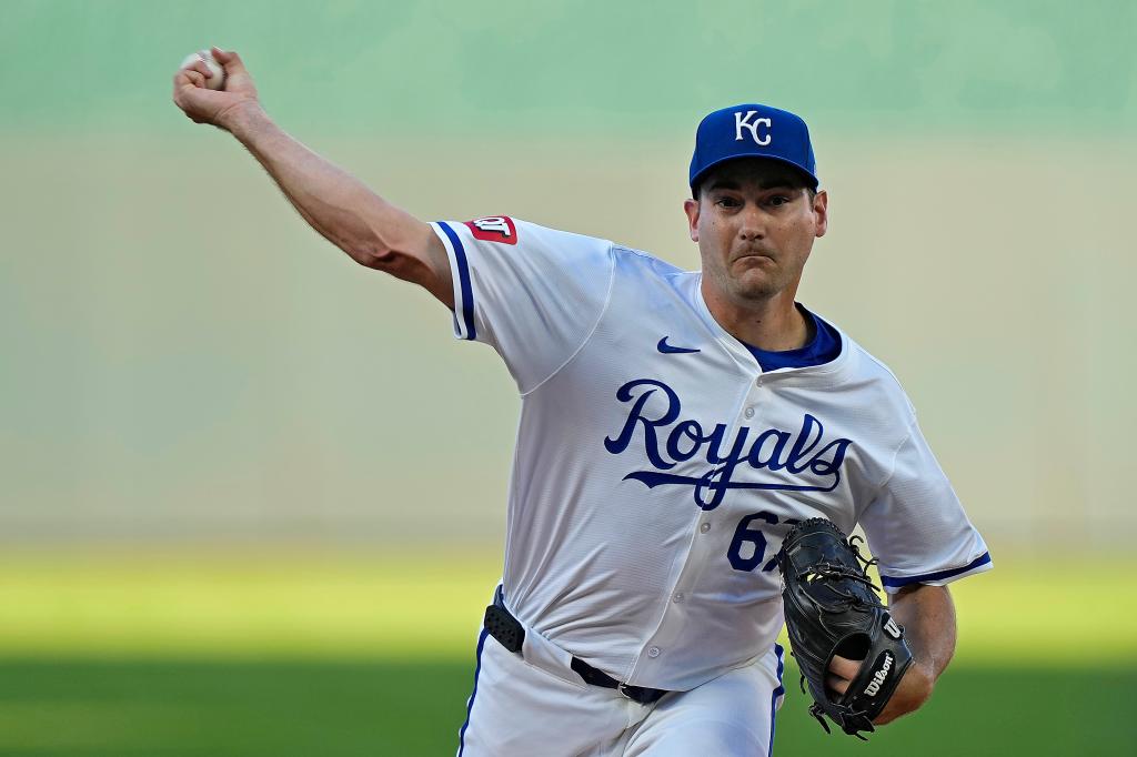 Royals starting pitcher Seth Lugo throws during the first inning of a baseball game against the New York Yankees