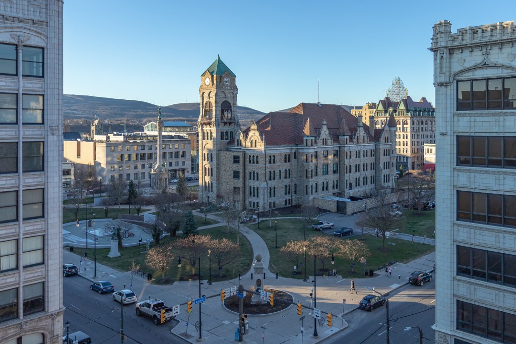 Lackawanna County Courthouse with a large clock tower and park in front, Scranton, PA, 2019