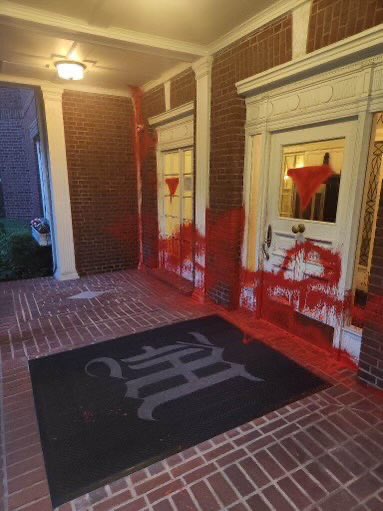 Red paint smeared all over home.