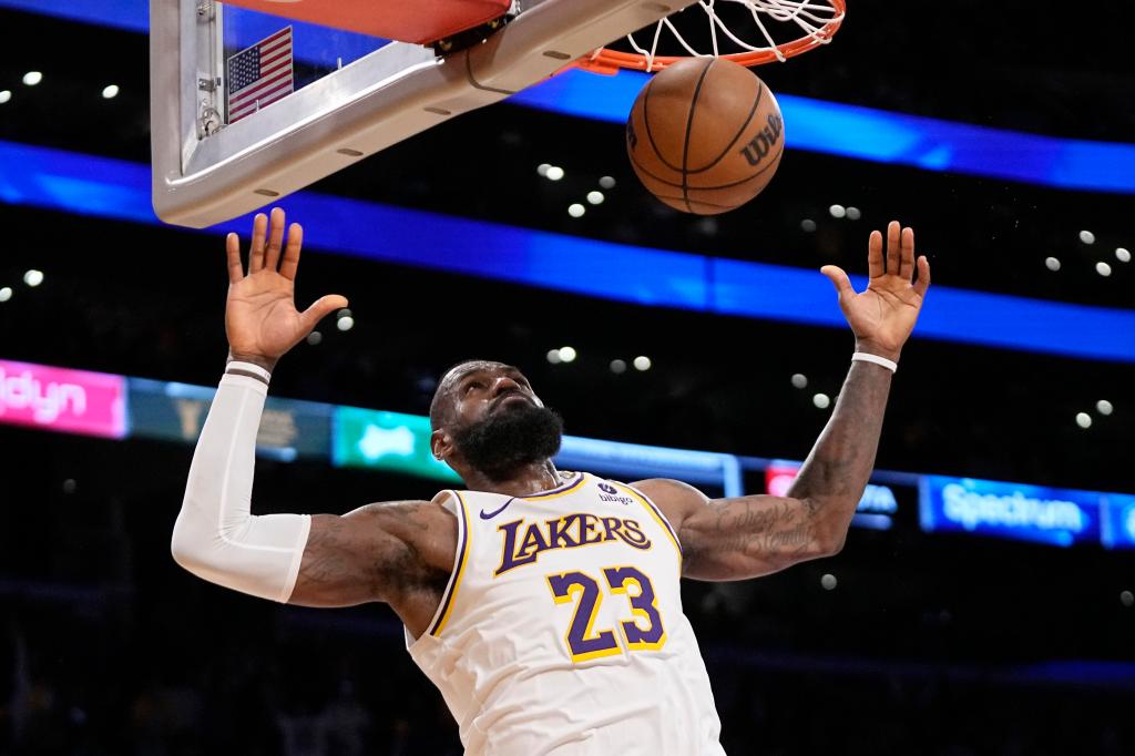 LeBron James of Los Angeles Lakers dunking a basketball during Game 4 of NBA playoffs against the Denver Nuggets