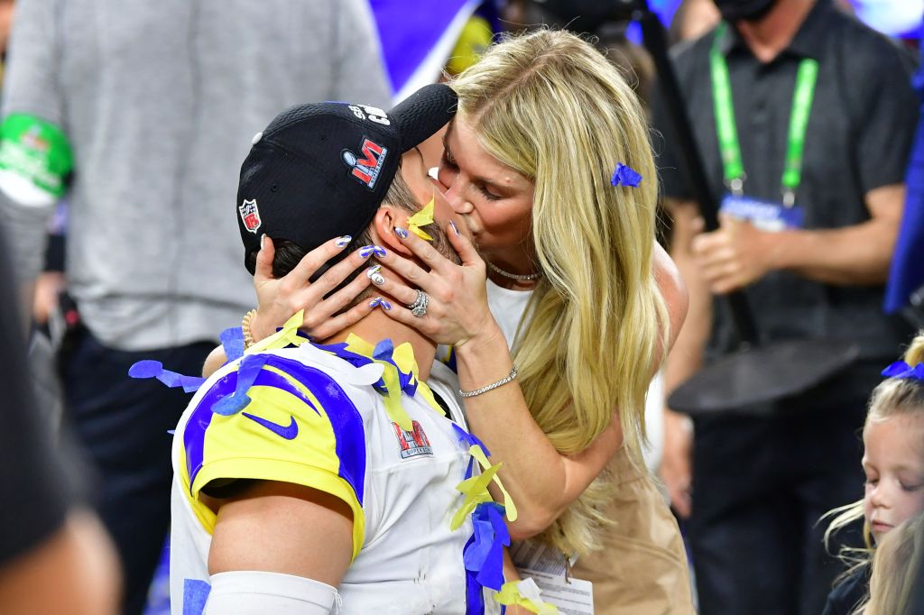 Matthew and Kelly Stafford kiss after the Rams' Super Bowl win over the Bengals in 2022.