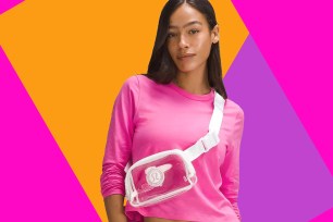 Woman in pink shirt wearing new clear Lululemon waist bag